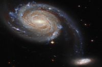 Hubble Space Telescope captures odd couple of galaxies