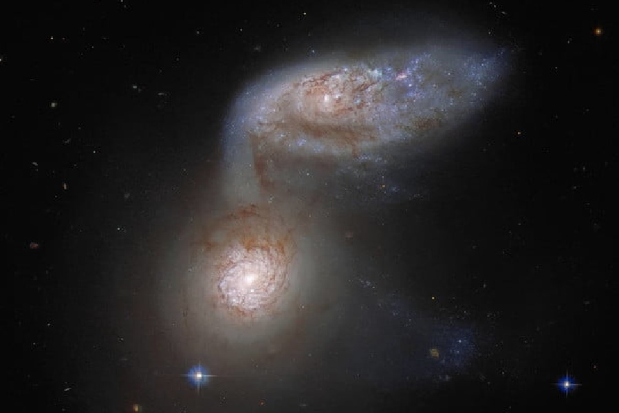 Hubble Space Telescope captures two merging galaxies